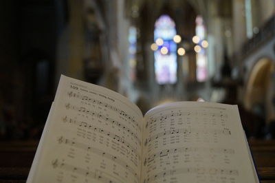 Close-up of text on book at temple