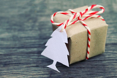 Close-up of christmas gift on table