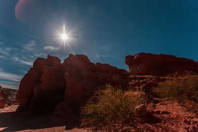 Rock formation on land against sky