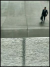 Man walking in sea