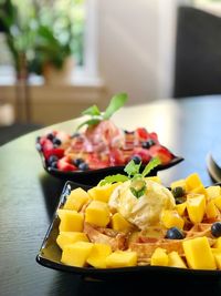 Close-up of breakfast served on table