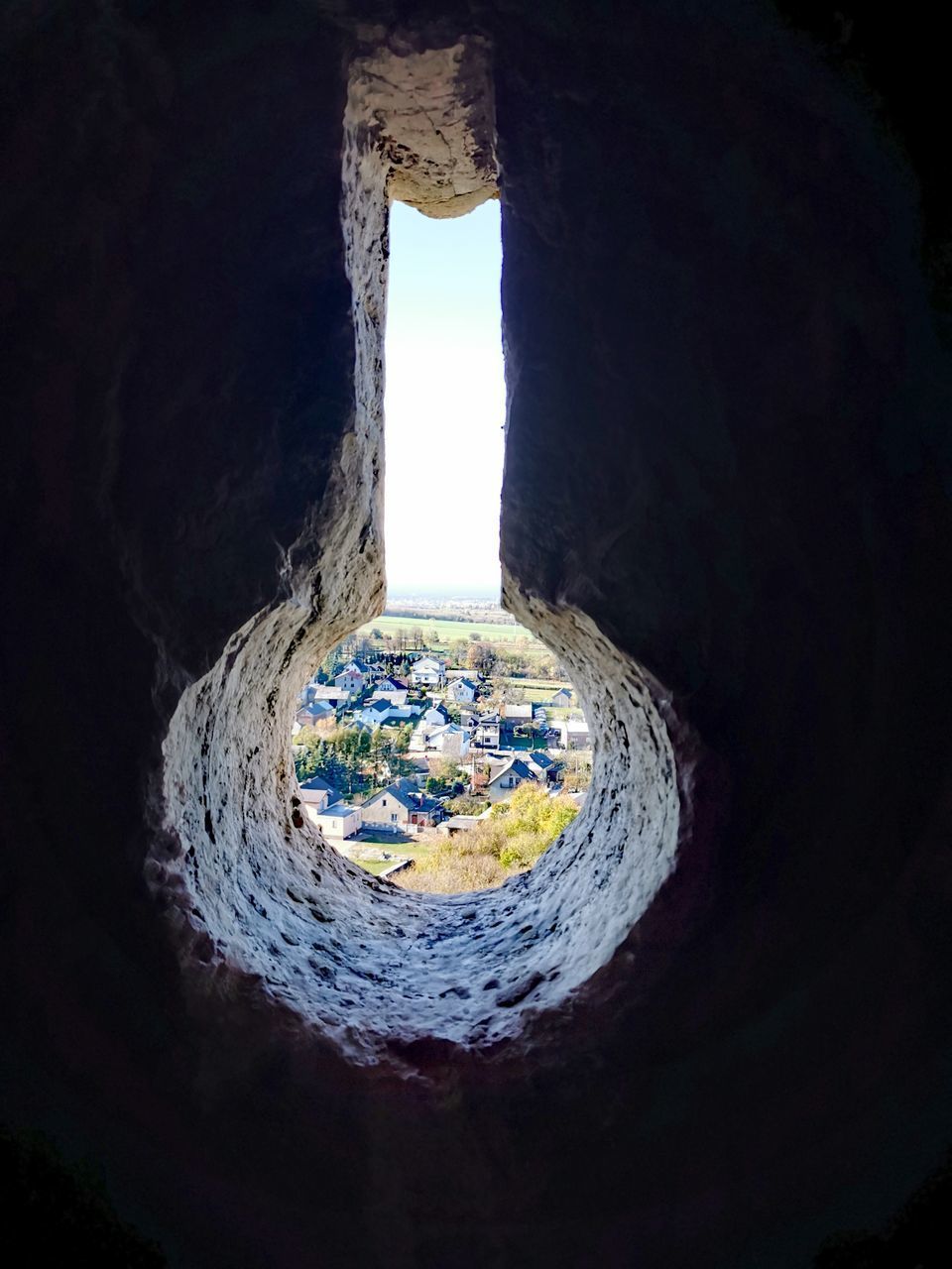 CLOSE-UP OF HOLE IN ROCK