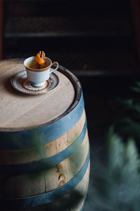 Hot toddy teacup drink on whiskey barrel