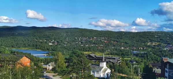 Scenic view of residential buildings against sky