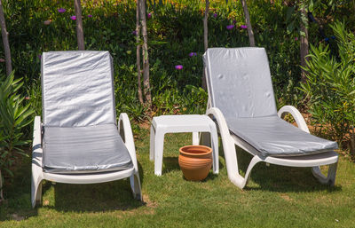 Empty chair in lawn