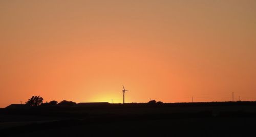 Scenic view of silhouette landscape against sky during sunset