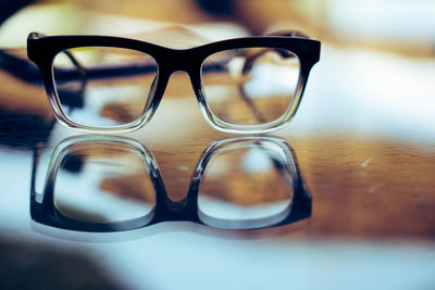 Close-up of sunglasses on table