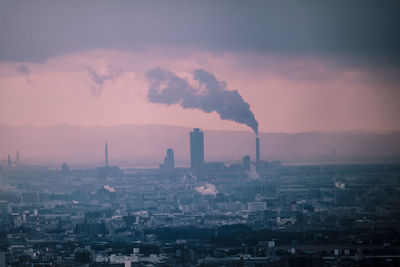 Cityscape against sky during sunset