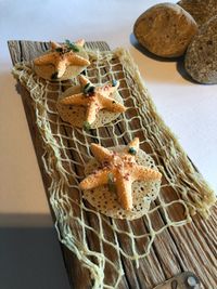 High angle view of bread in basket on table