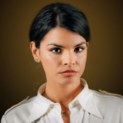 Emotion seriousness. face of a serious young woman, expressing seriousness, studio portrait