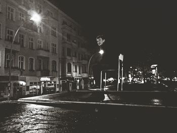 Illuminated street light at night