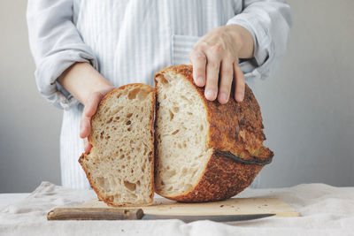 Midsection of man preparing food