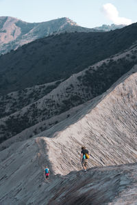 People on mountain road