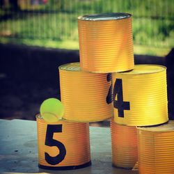 Close-up of yellow stack on metal