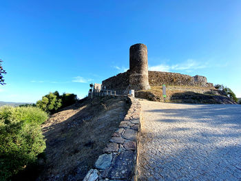 Old ruins against blue sky