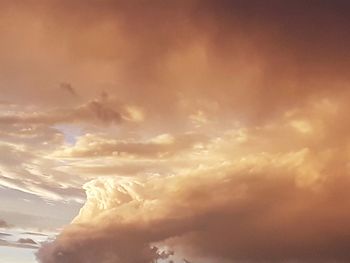 Low angle view of clouds in sky during sunset