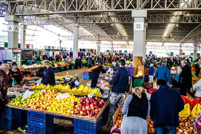 Rear view of people in market