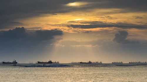 Panoramic view of sea against sky during sunset