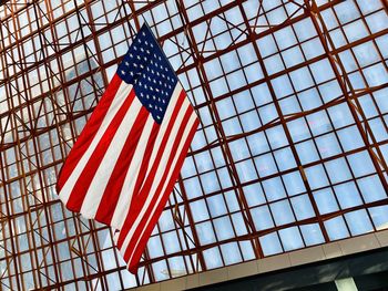 Low angle view of flags hanging against ceiling