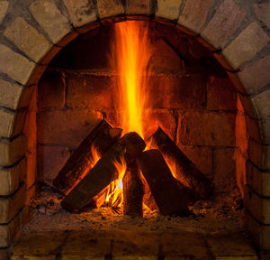 Bonfire on wooden wall