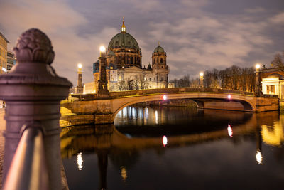 Illuminated buildings in water