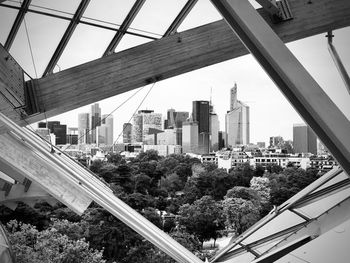 High angle view of modern buildings against sky