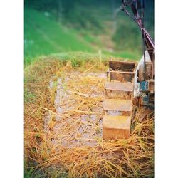 Close-up of hay bales on field