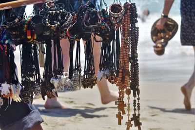 Close-up of decorations hanging at market stall