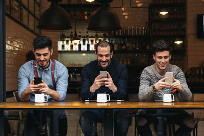 Business people having drink in cafe