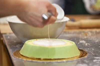 Close-up of person preparing food