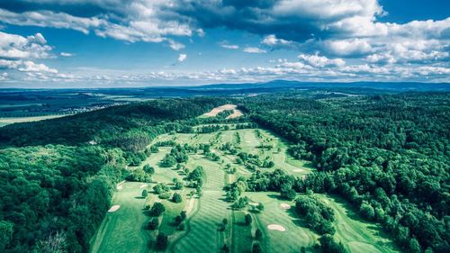 Aerial view of agricultural landscape against sky