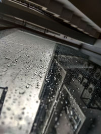 Close-up of raindrops on glass window