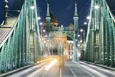 Light trails on bridge at night