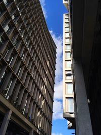 Low angle view of modern buildings against sky