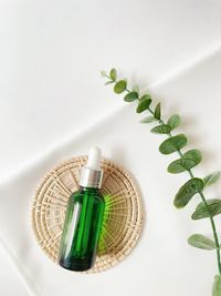 High angle view of beauty products on white background