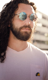 Portrait of young woman wearing sunglasses