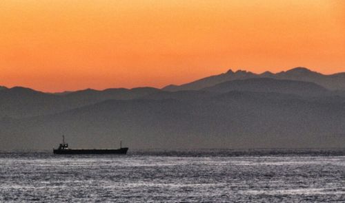 Scenic view of sea at sunset