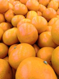 Full frame shot of oranges at market stall