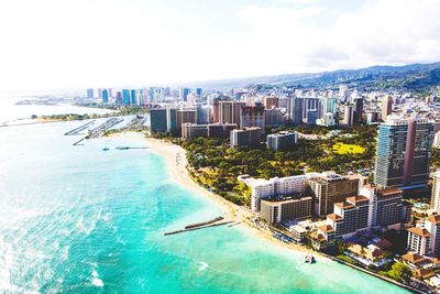 View of cityscape with sea in background