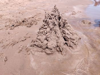 High angle view of sand at beach
