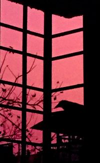 Close-up of window at sunset