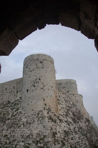 Low angle view of fort against sky