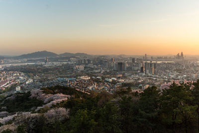 High angle view of townscape against sky during sunset