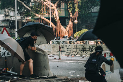 People on street in city