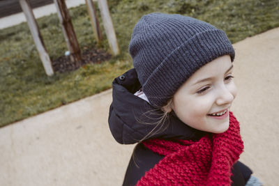 Close-up of girl in park during winter