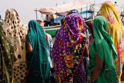 Rear view of women in sari