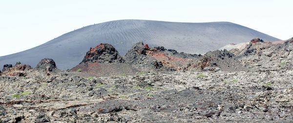 Panoramic view of volcanic landscape against clear sky