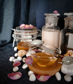 Close-up of drink in glass jar on table