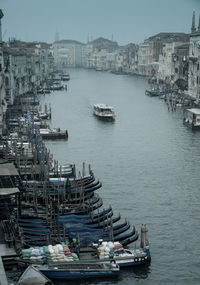 High angle view of boats moored at harbor