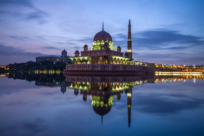 Reflection of illuminated buildings in water